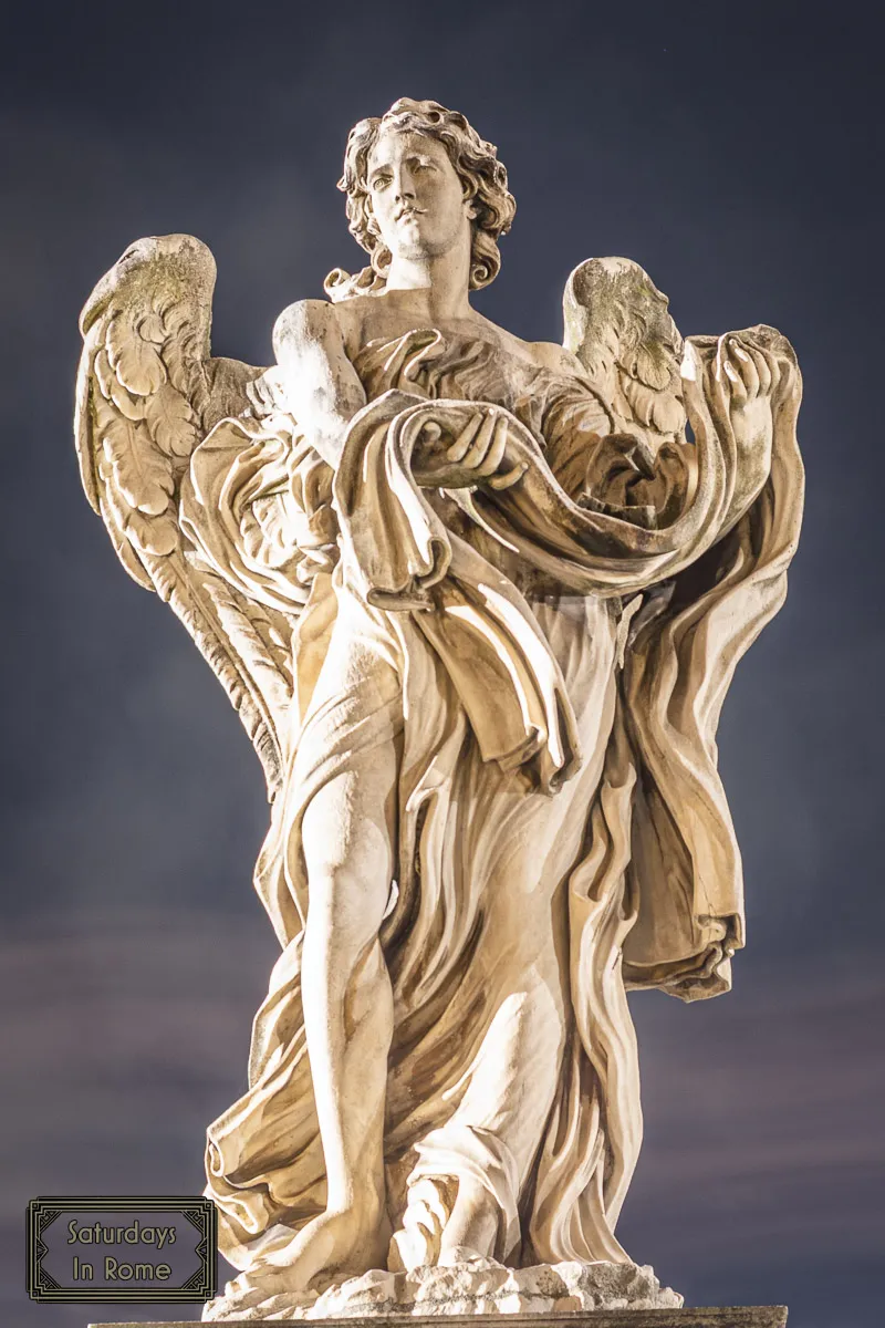Ponte Sant Angelo - holding vestments