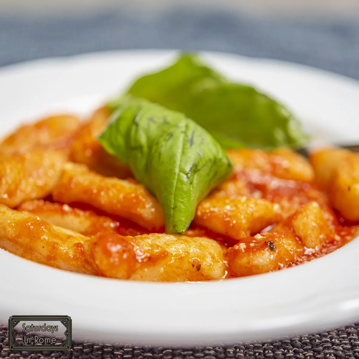 Traditional Italian Gnocchi Recipe - Gnocchi with tomato sauce and basil